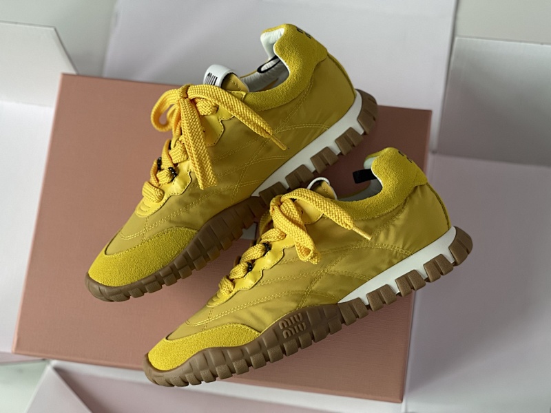 Miu Miu yellow sneakers