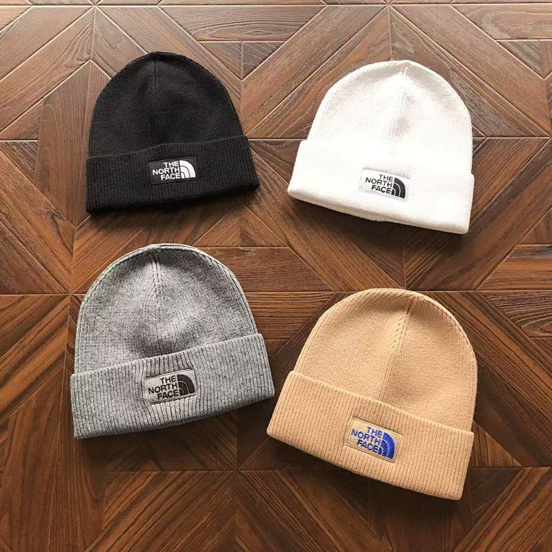 TNF CAPS (8)