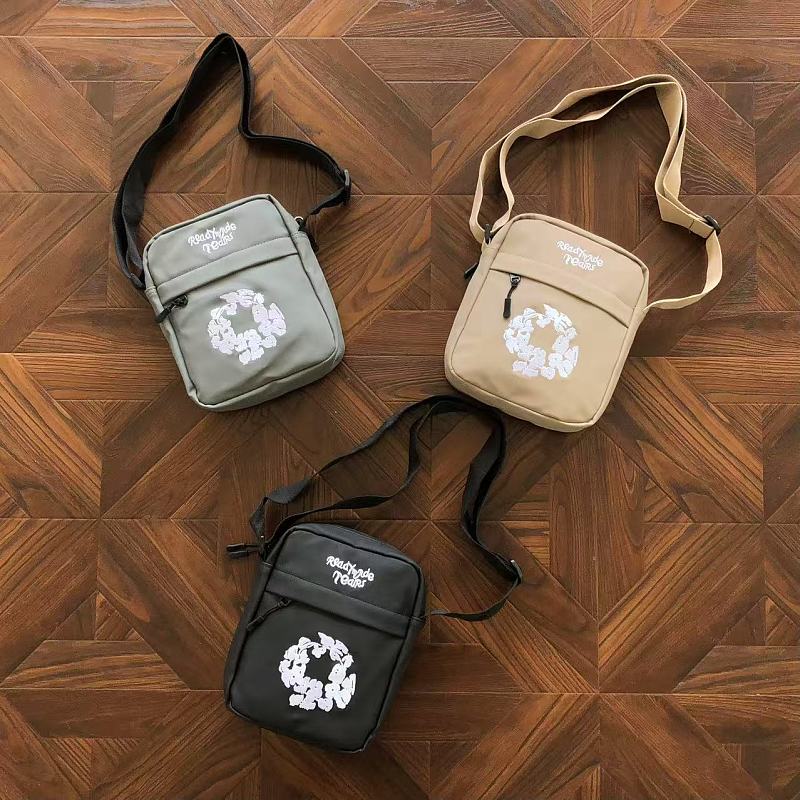 DENIM TEARS BAGS